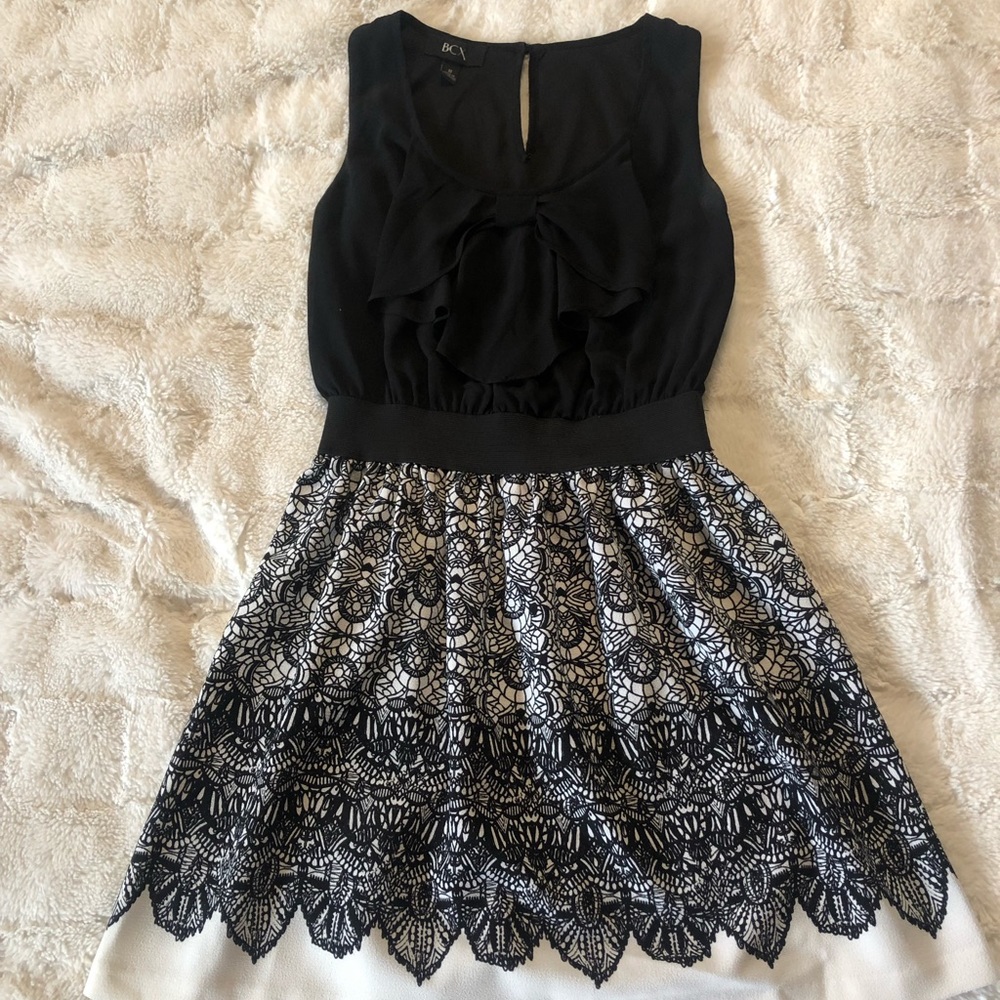 black dress with bow design in front SIZE medium